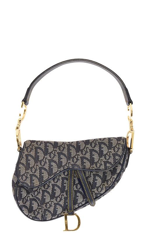 fwrd renew dior vintage diorissimo saddle bag in blue.