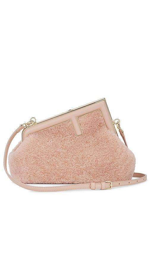 fwrd renew fendi shearling first bag in blush.