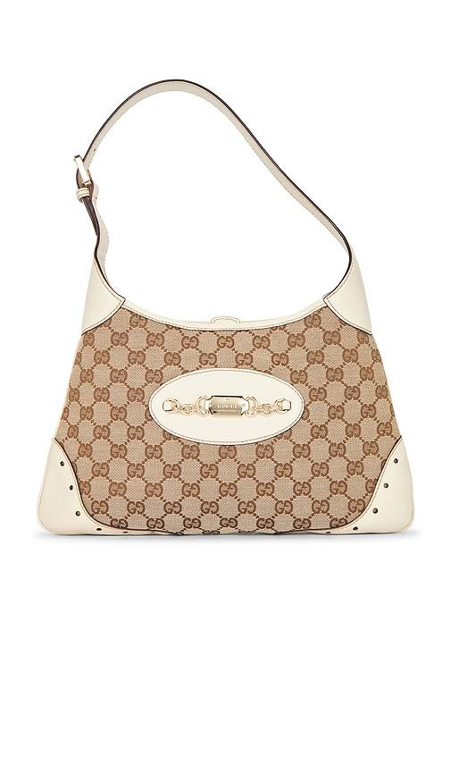 fwrd renew gucci punch hobo bag in beige.