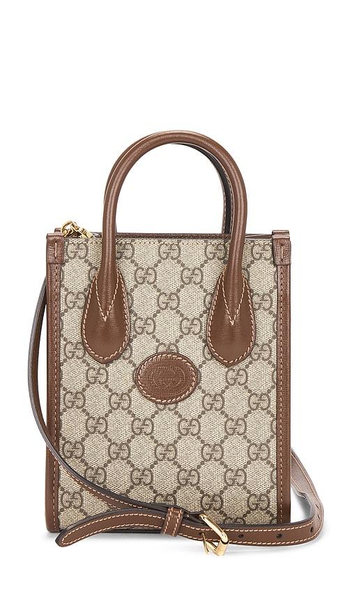 fwrd renew gucci retro interlocking g mini tote bag in beige.