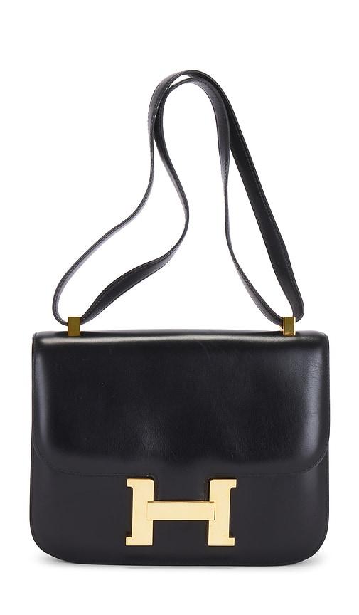 fwrd renew hermes 1976 box constance 23 shoulder bag in black.