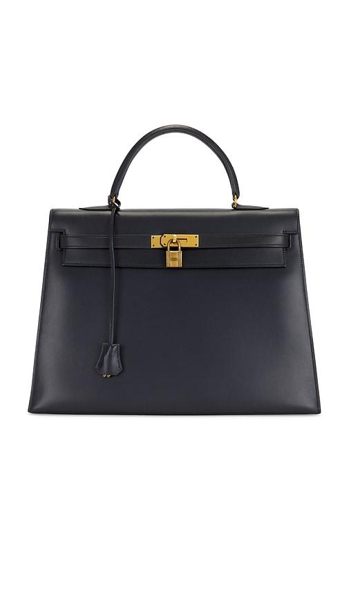 fwrd renew hermes 1977 box kelly 35 handbag in navy.