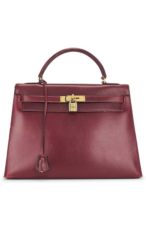 fwrd renew hermes 1979 box kelly 32 handbag in red.