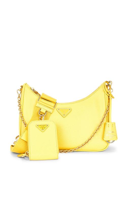 fwrd renew prada saffiano re-edition 2005 shoulder bag in yellow.