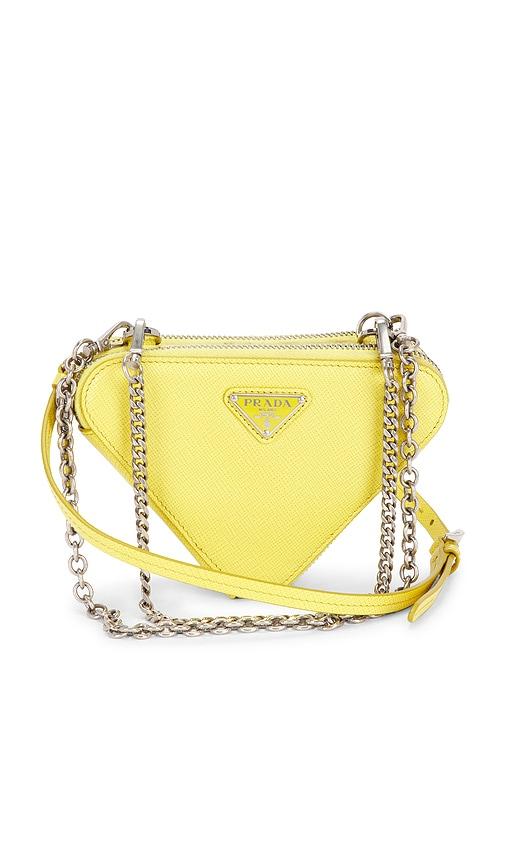 fwrd renew prada saffiano triangle shoulder bag in yellow.