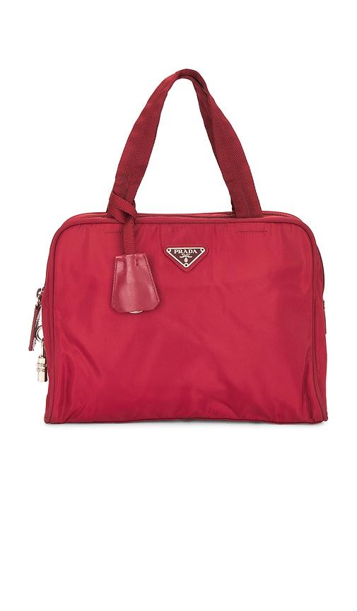 fwrd renew prada tessuto handbag in red.