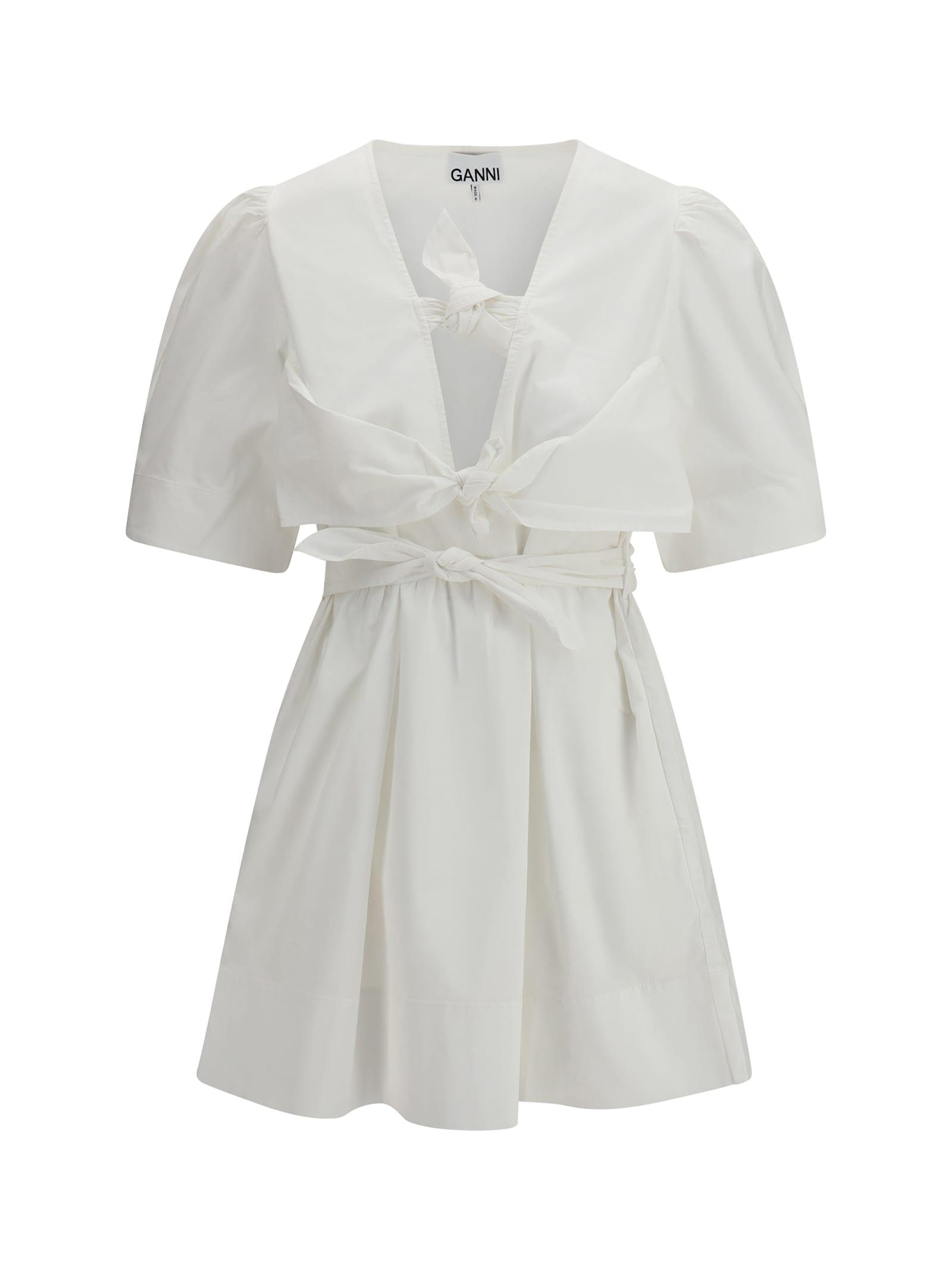 ganni mini dress with a deep v-neckline and front tie bands