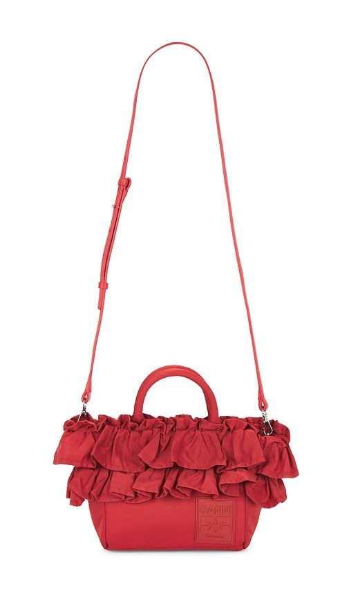 ganni mini shopper ruffle bag in red.