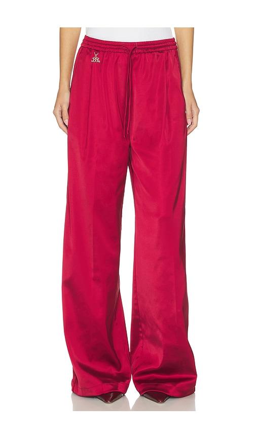 gestuz x barbie ricky track pants in red.