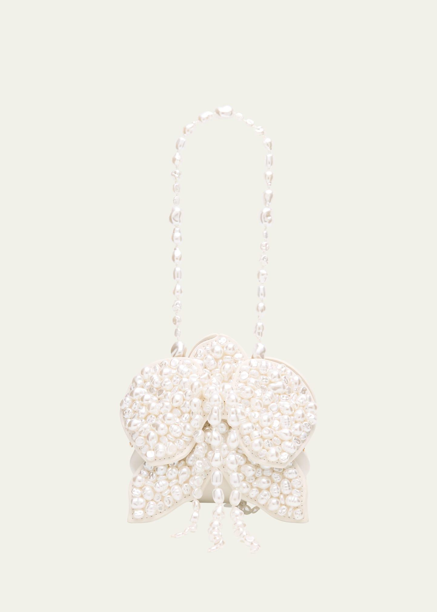 giula pearlescent flower wristlet