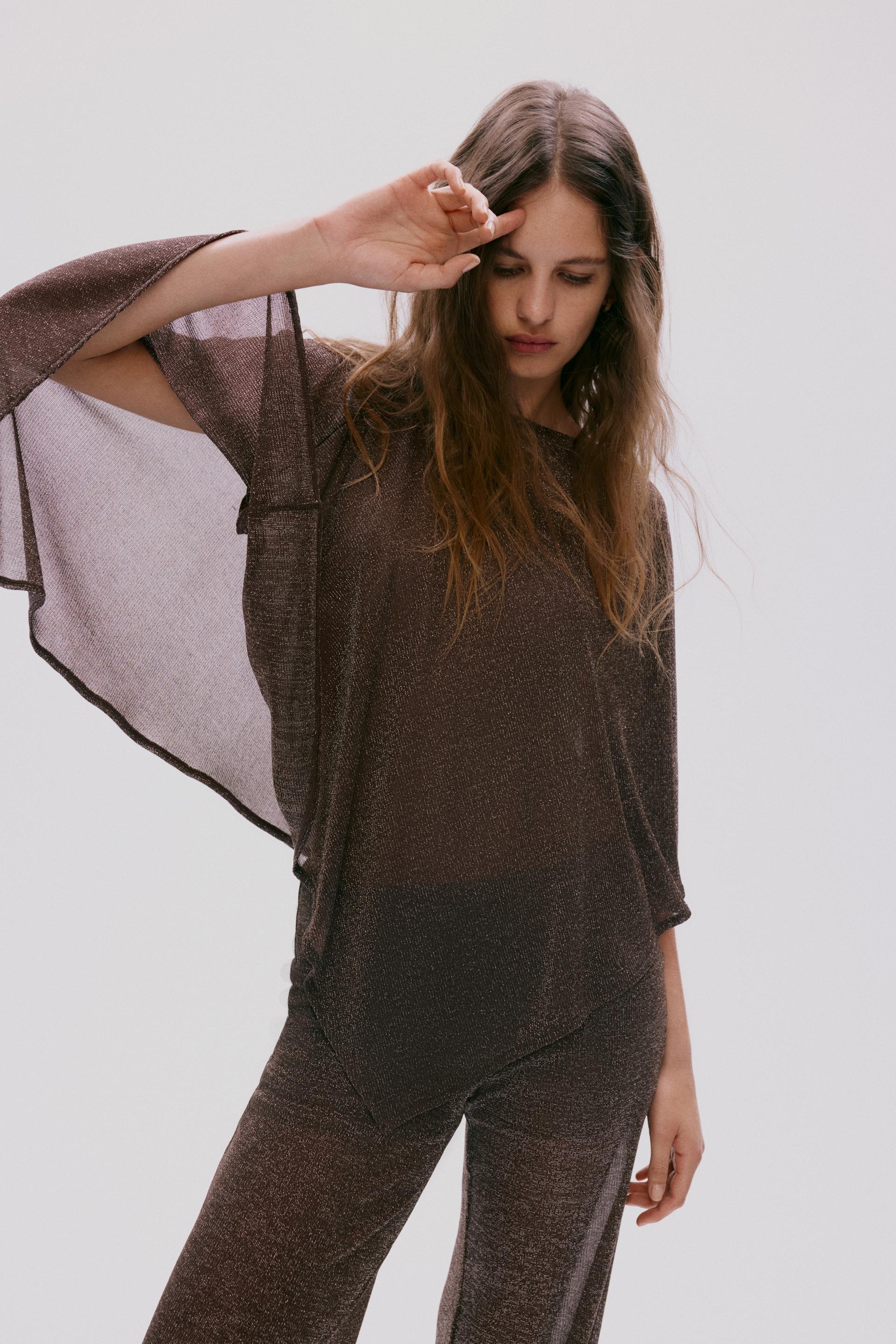 glittery cape top