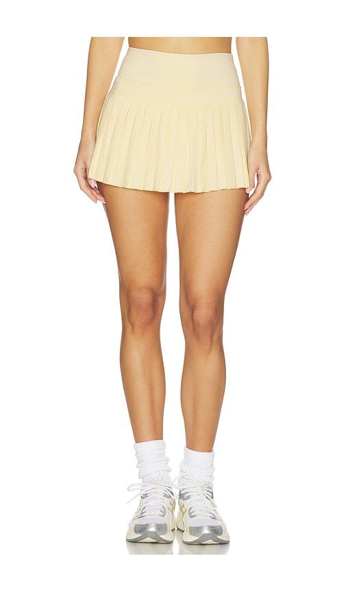 gold hinge pleated tennis skirt in yellow.