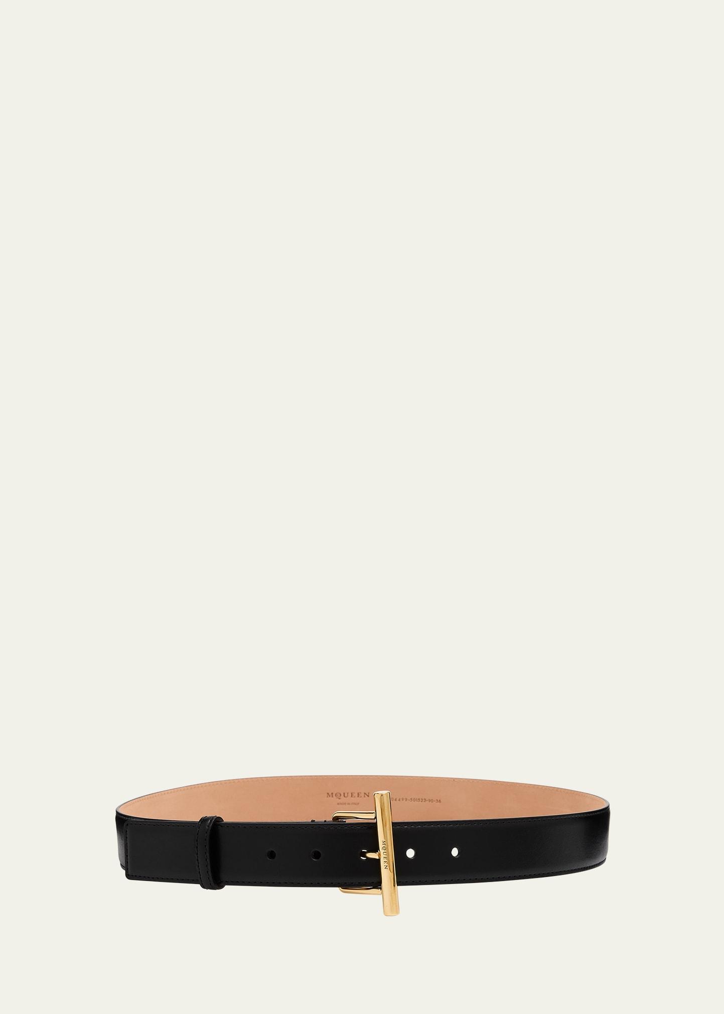 golden cross-bar leather sling belt