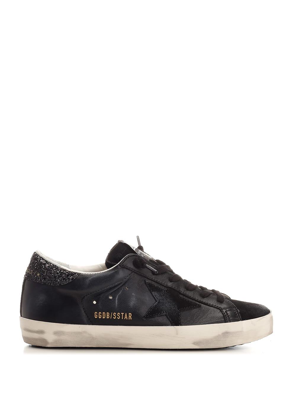 golden goose black super-star sneakers