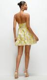 golden yellow strapless cat-eye floral jacquard corset mini dress with ruffle hem