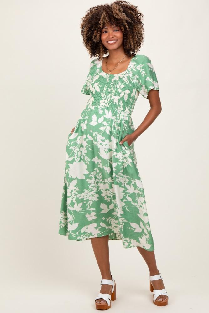 green floral smocked short sleeve maternity midi dress