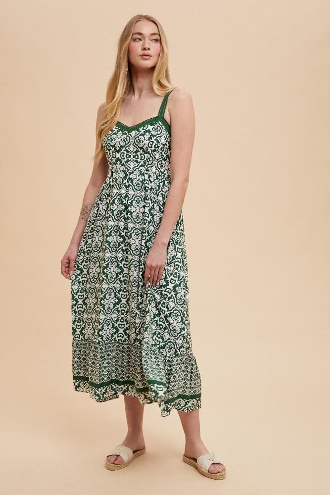 green sleeveless border print maxi dress