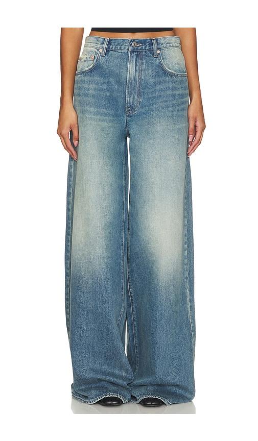 grlfrnd luna mid rise baggy wide leg jeans in denim-medium.