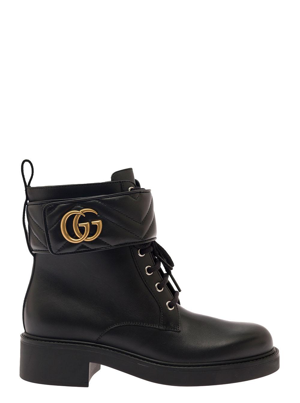 gucci black ankle boot with double g and textured hardware in leather woman