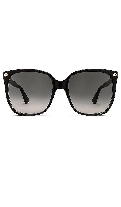 gucci light acetate cat eye sunglasses in black.
