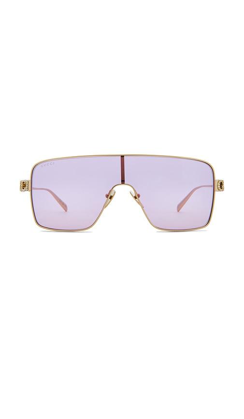 gucci mask sunglasses in metallic gold.