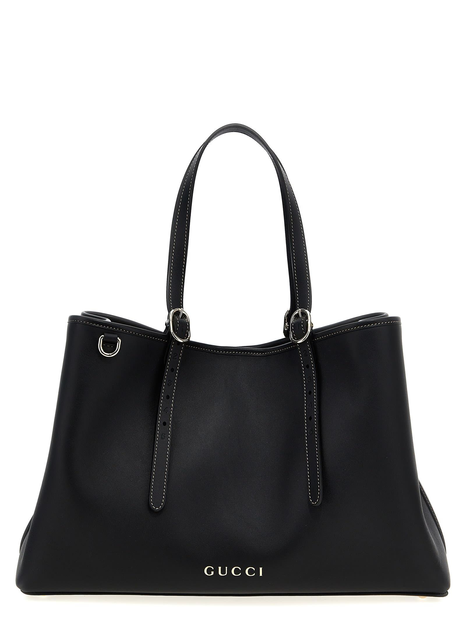 gucci medium gg emblem shopping bag