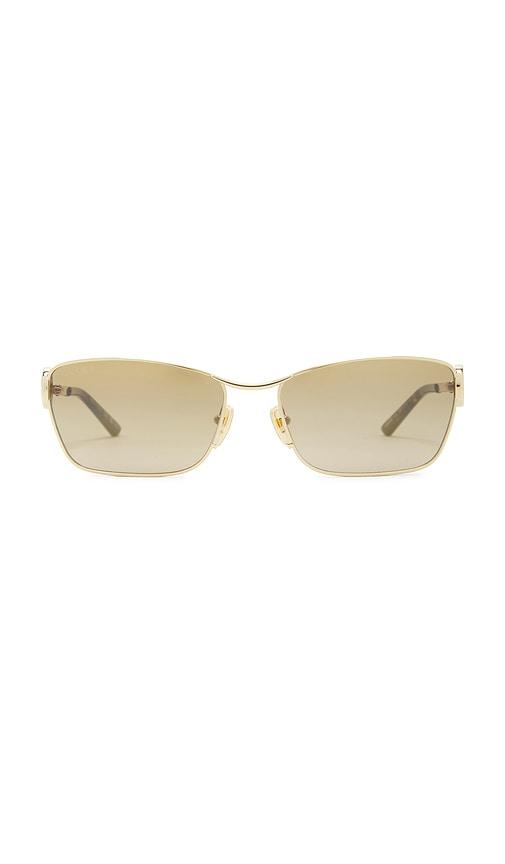 gucci rectangular sunglasses in metallic gold.