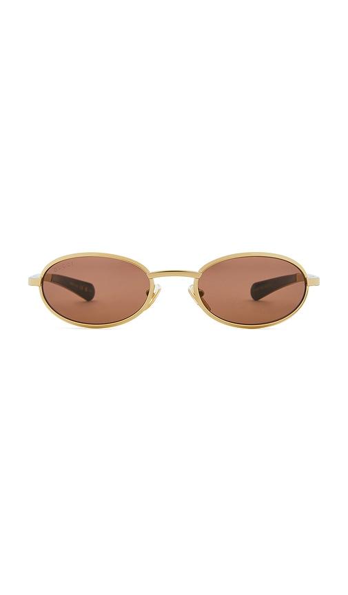 gucci rodeo drive sunglasses in metallic gold.