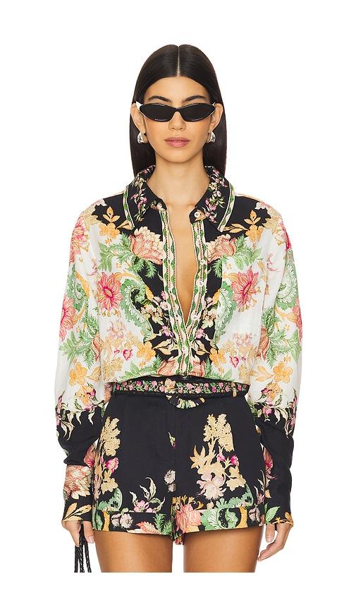 hemant and nandita oversized shirt with hand crafted buttons in green.
