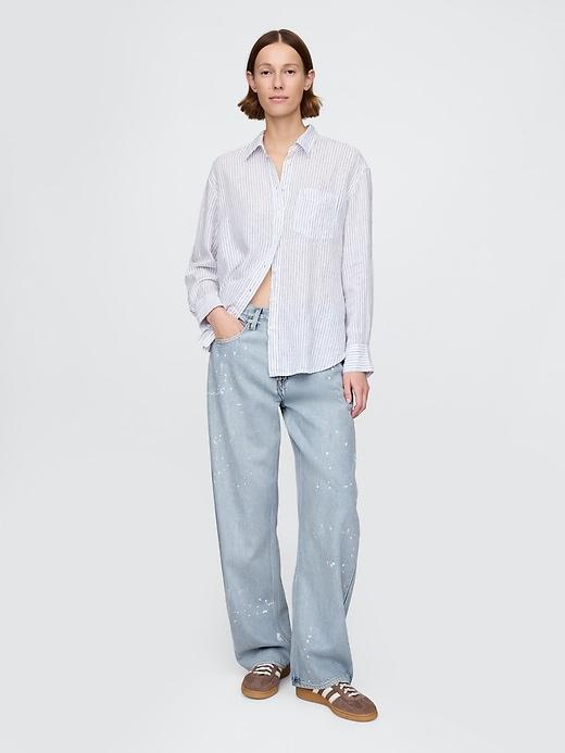 high rise crossover barrel jeans