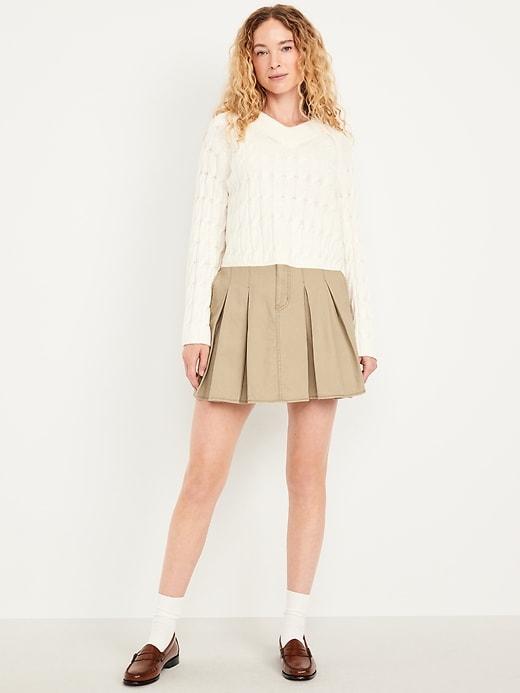 high-waisted pleated mini skirt