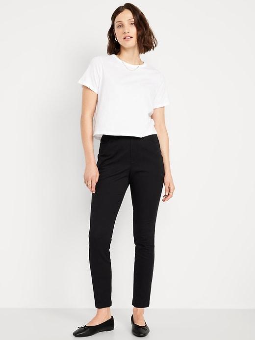 high-waisted uniform skinny pants