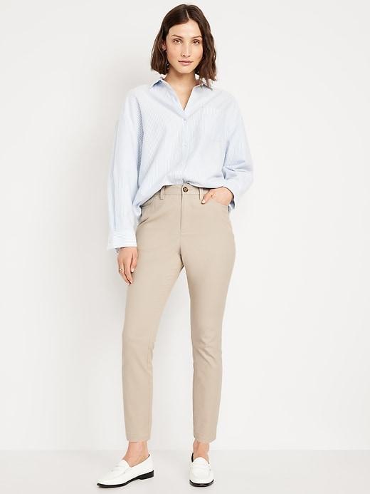 high-waisted uniform skinny pants