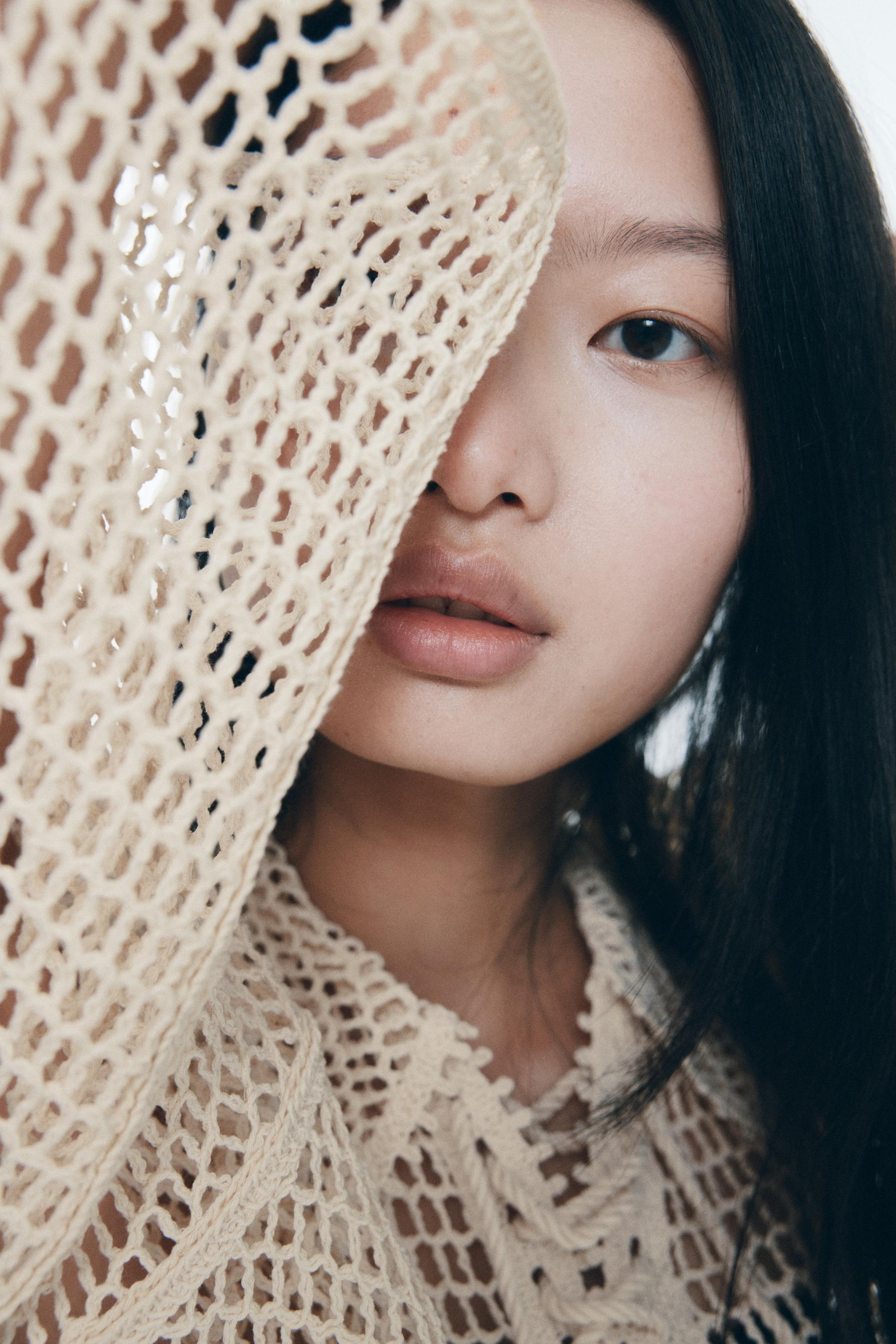 hole-knit lace-up top