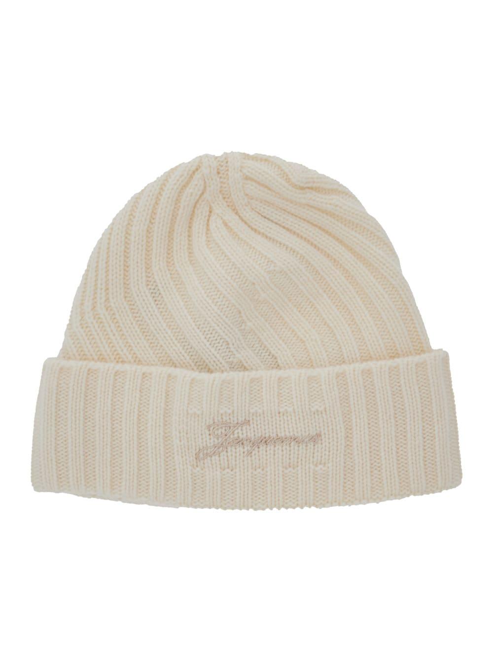 jacquemus le bonnet tourni white beanie with turn-up brim and logo lettering on the front in wool man