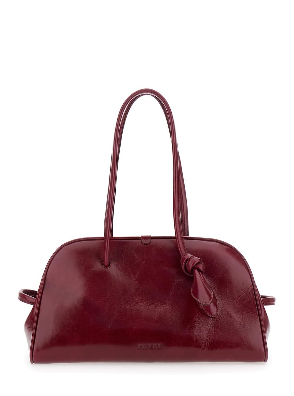 jacquemus turismo bordeaux shoulder bag with double handles and logo lettering on the front in leather woman