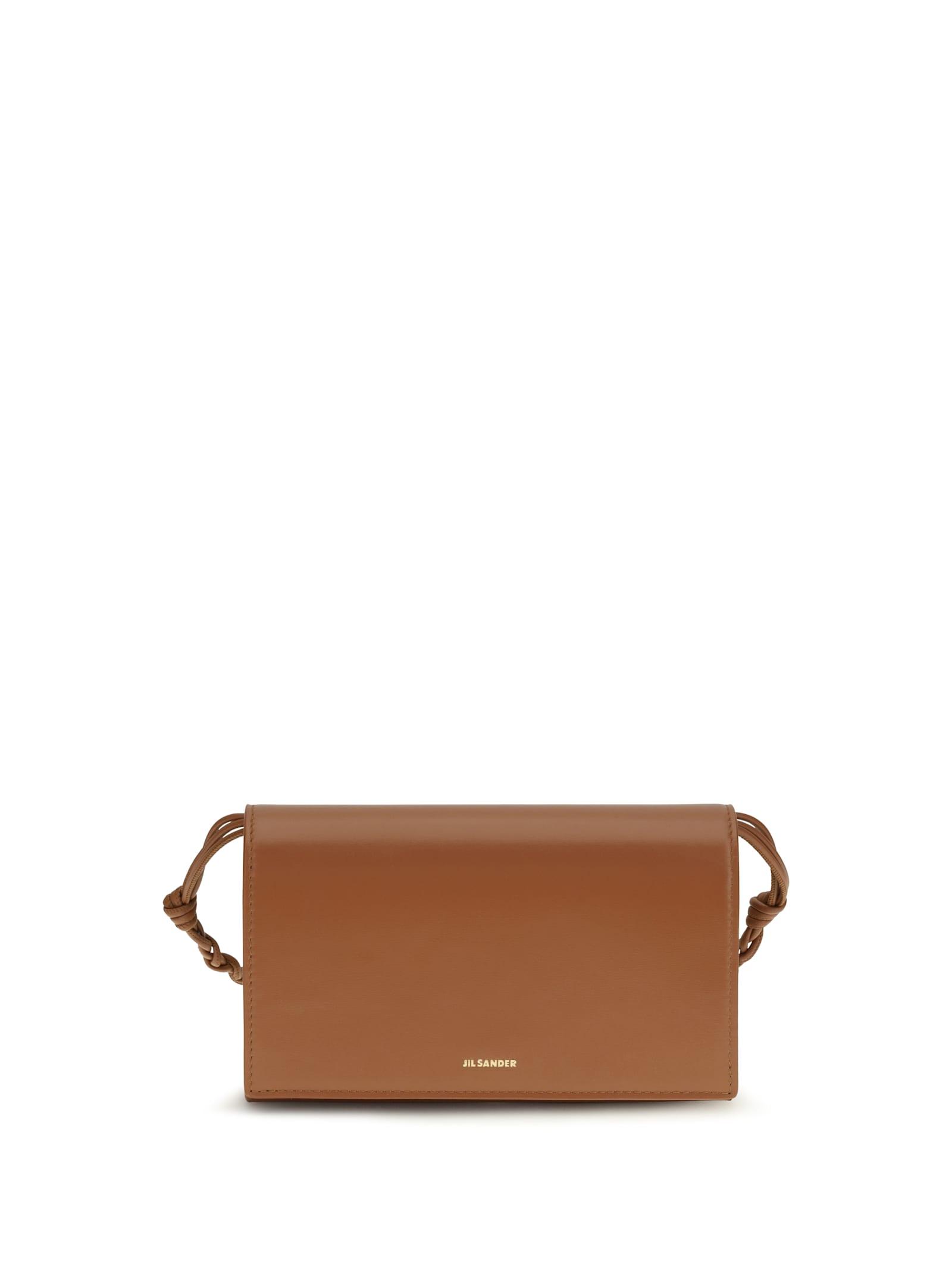 jil sander tangle wallet with shoulder strap