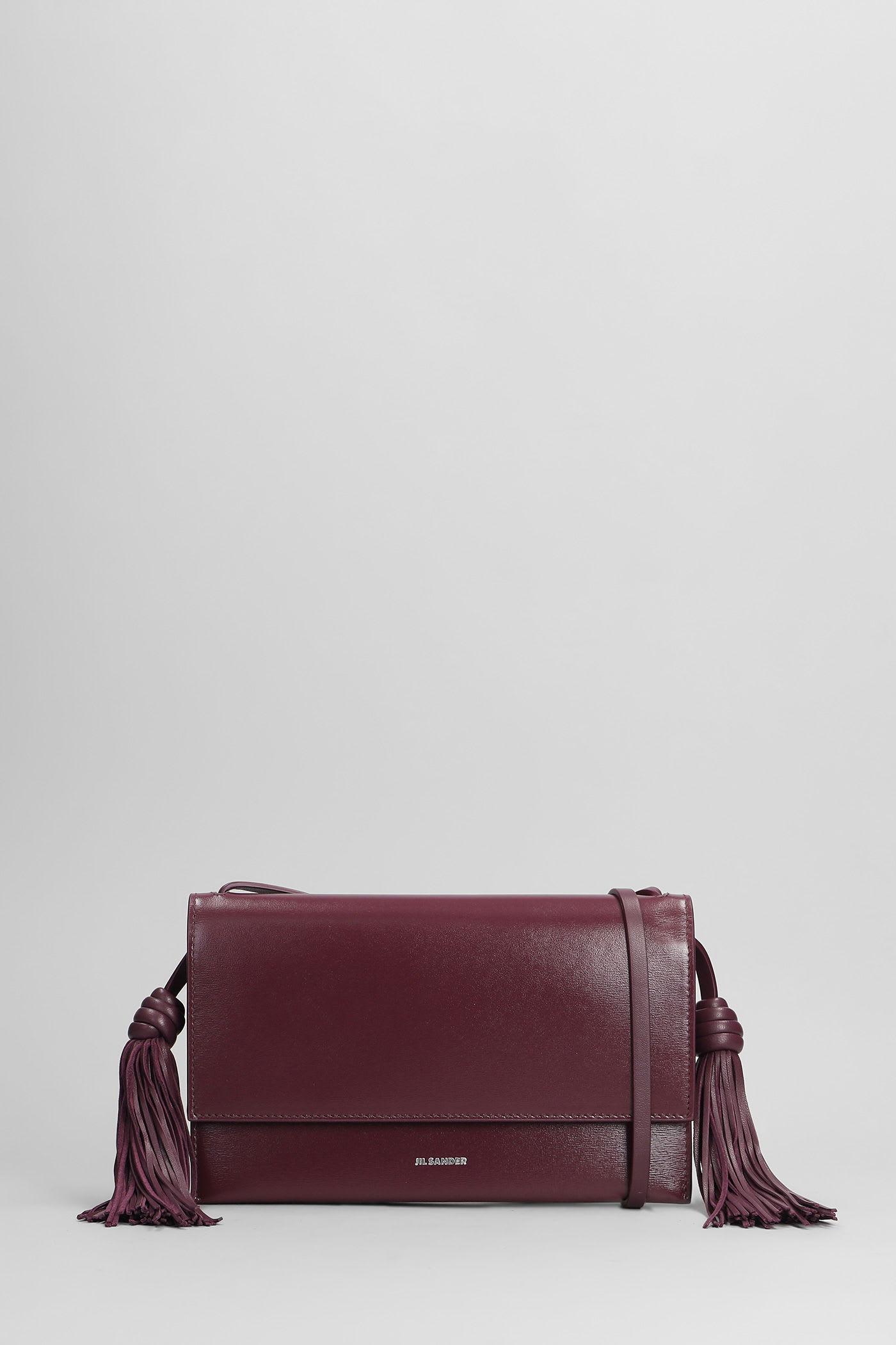 jil sander tassel shoulder bag in viola leather