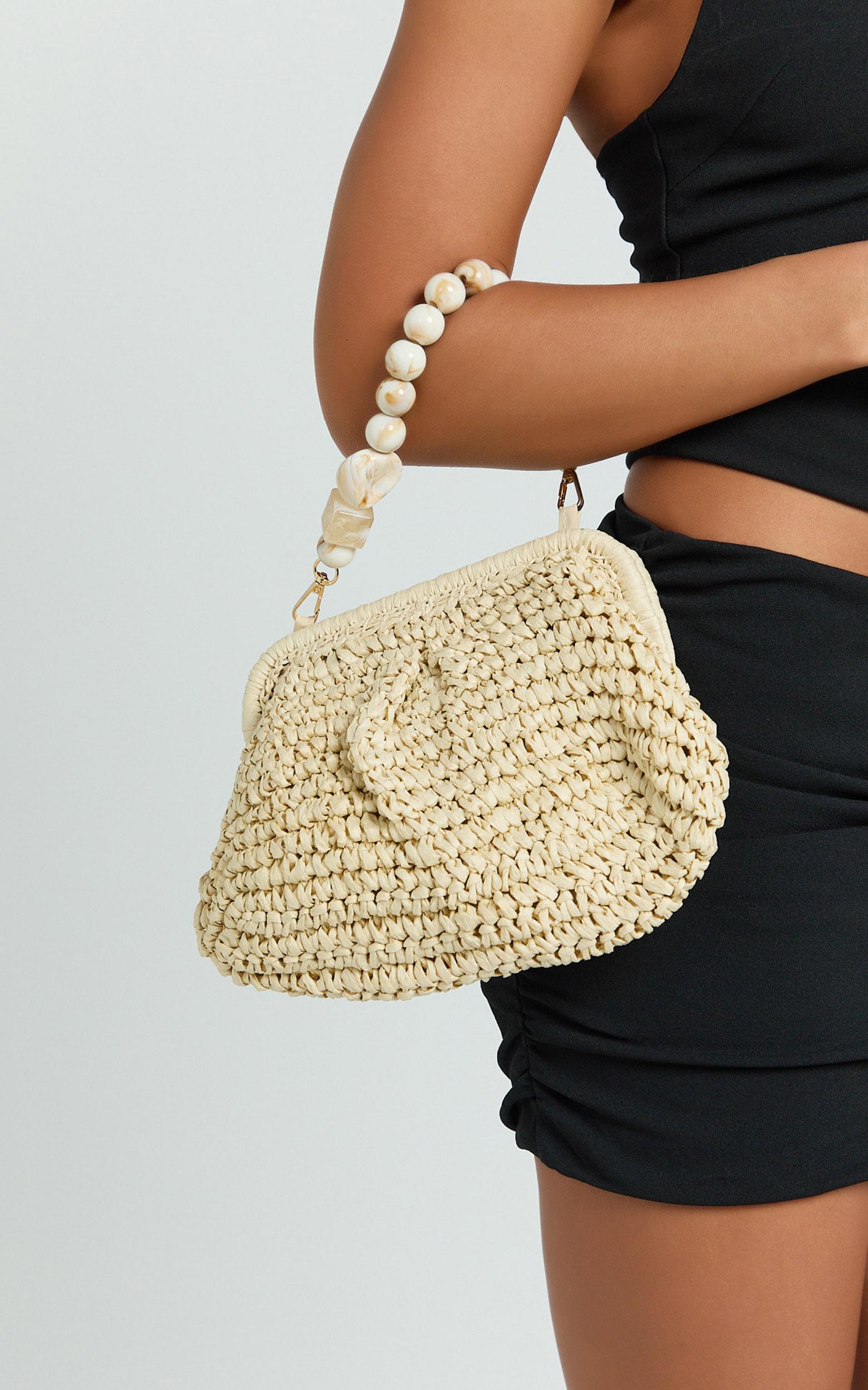 josephine straw clutch with beaded trim in natural
