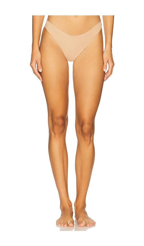 journelle estelle thong in tan.