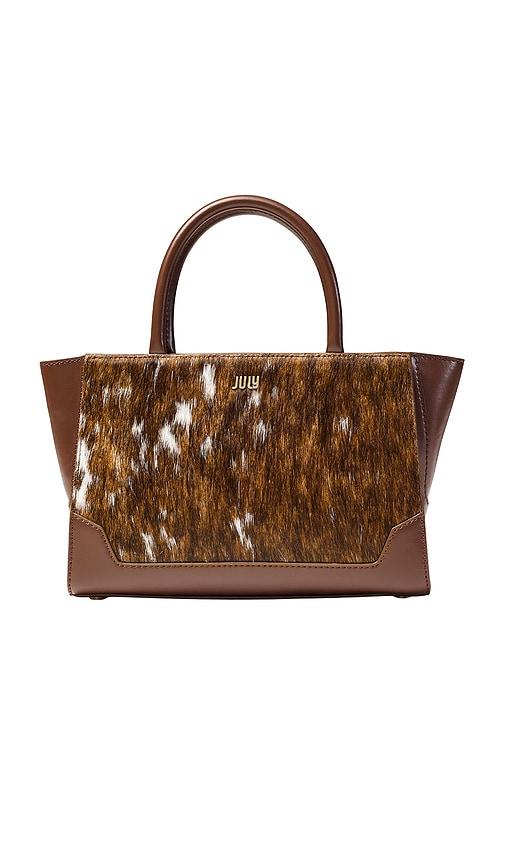 july juliette winged cow print crossbody in brown.