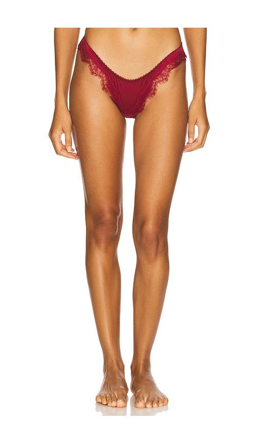 kat the label x revolve sorrento thong in purple.