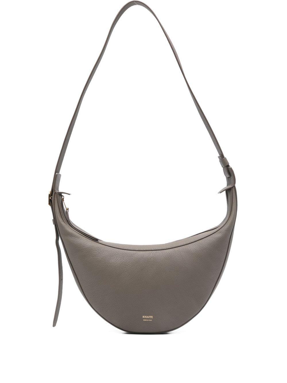 khaite augustina small leather crossbody bag