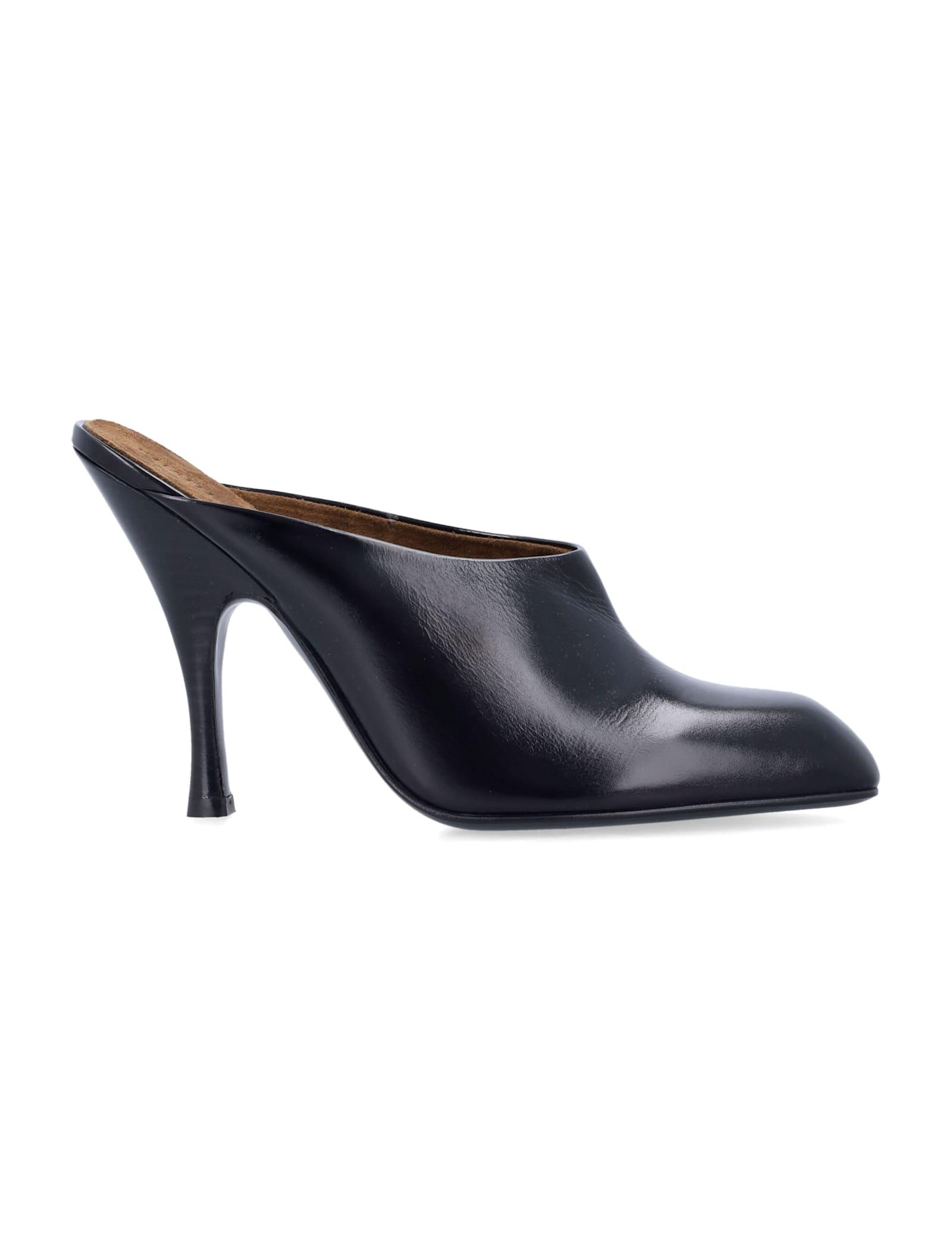 khaite black glazed leather colt mule