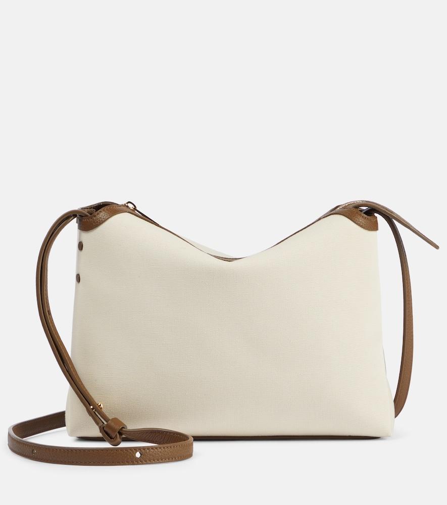 khaite lina leather-trimmed canvas crossbody bag