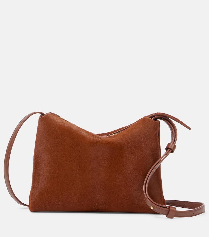 khaite lina medium calf hair crossbody bag