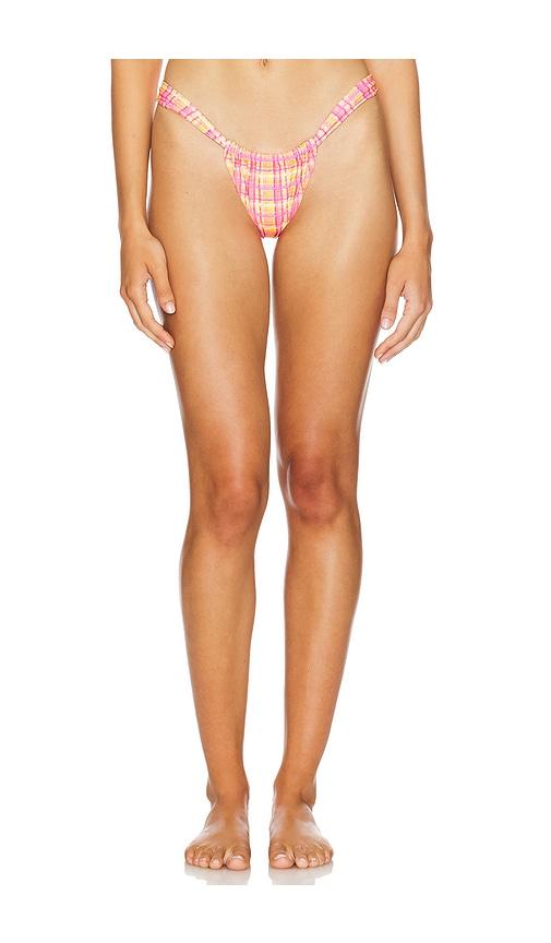 kulani kinis ruched thong bikini bottom in pink.