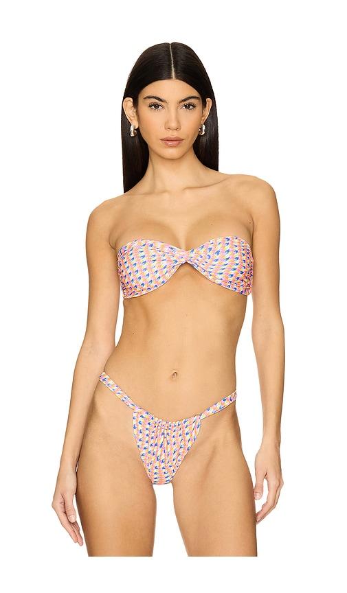 kulani kinis twist bandeau bikini top in orange.