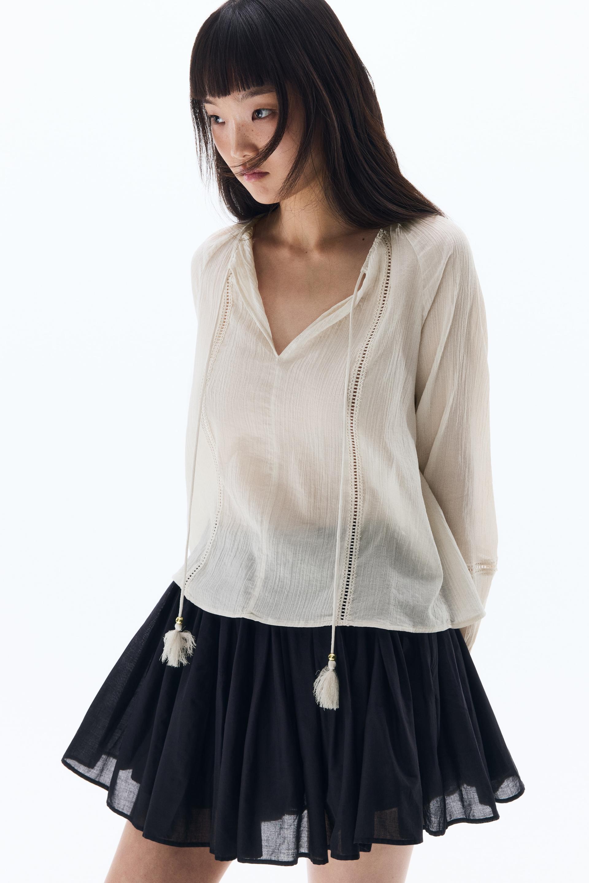 lace-inset balloon-sleeved blouse