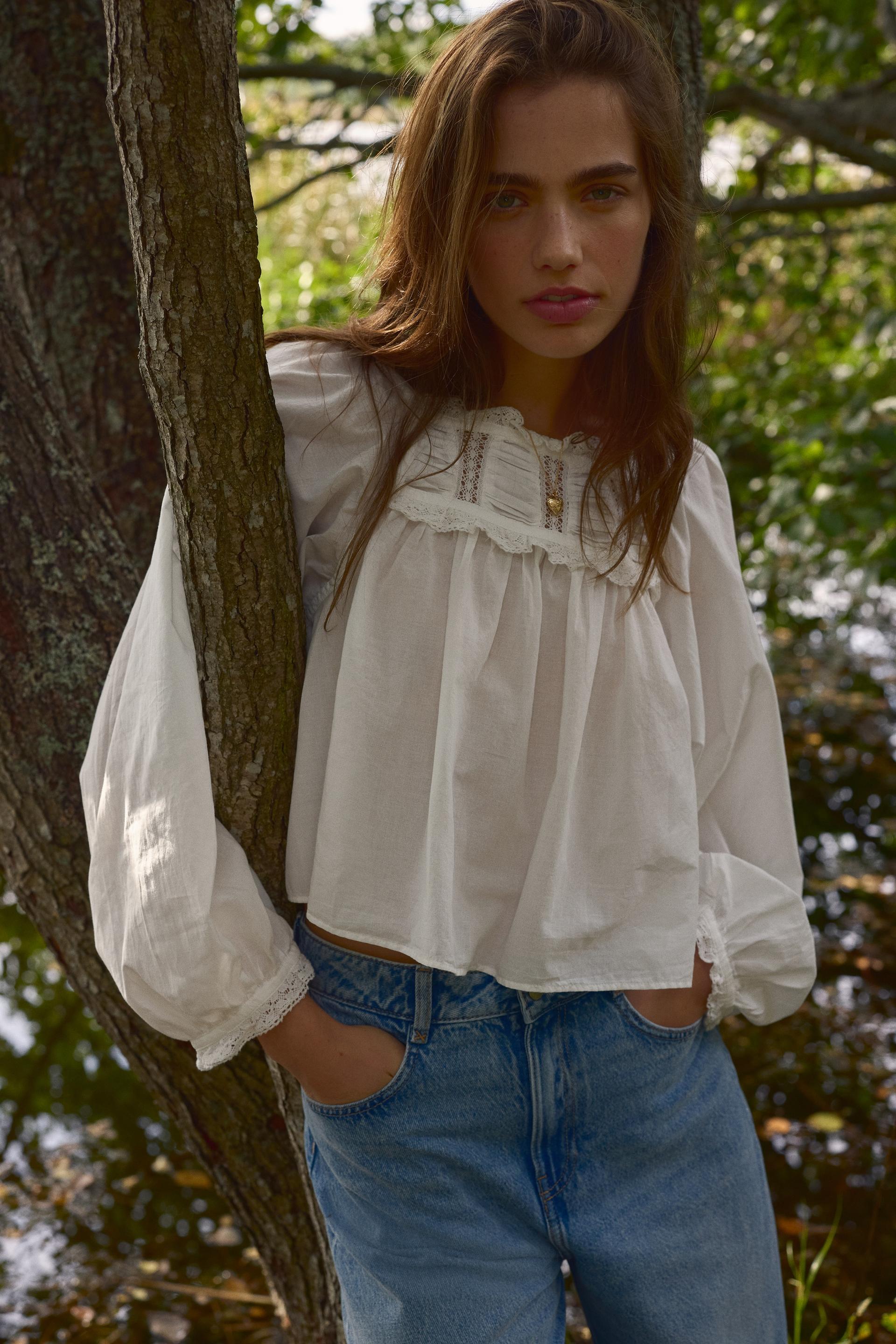 lace-trimmed cotton blouse